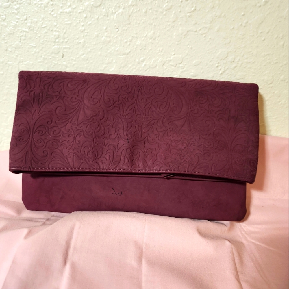 Color Brilliance brand burgundy color clutch bag